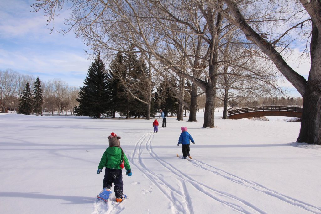 family snowshoeing